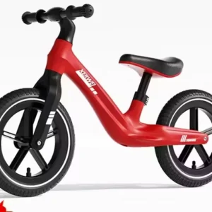 Bicicleta de impulso roja para niños con diseño moderno.