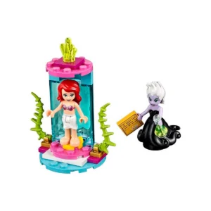 Minifigura de princesa sirena en cápsula mágica con bruja marina.