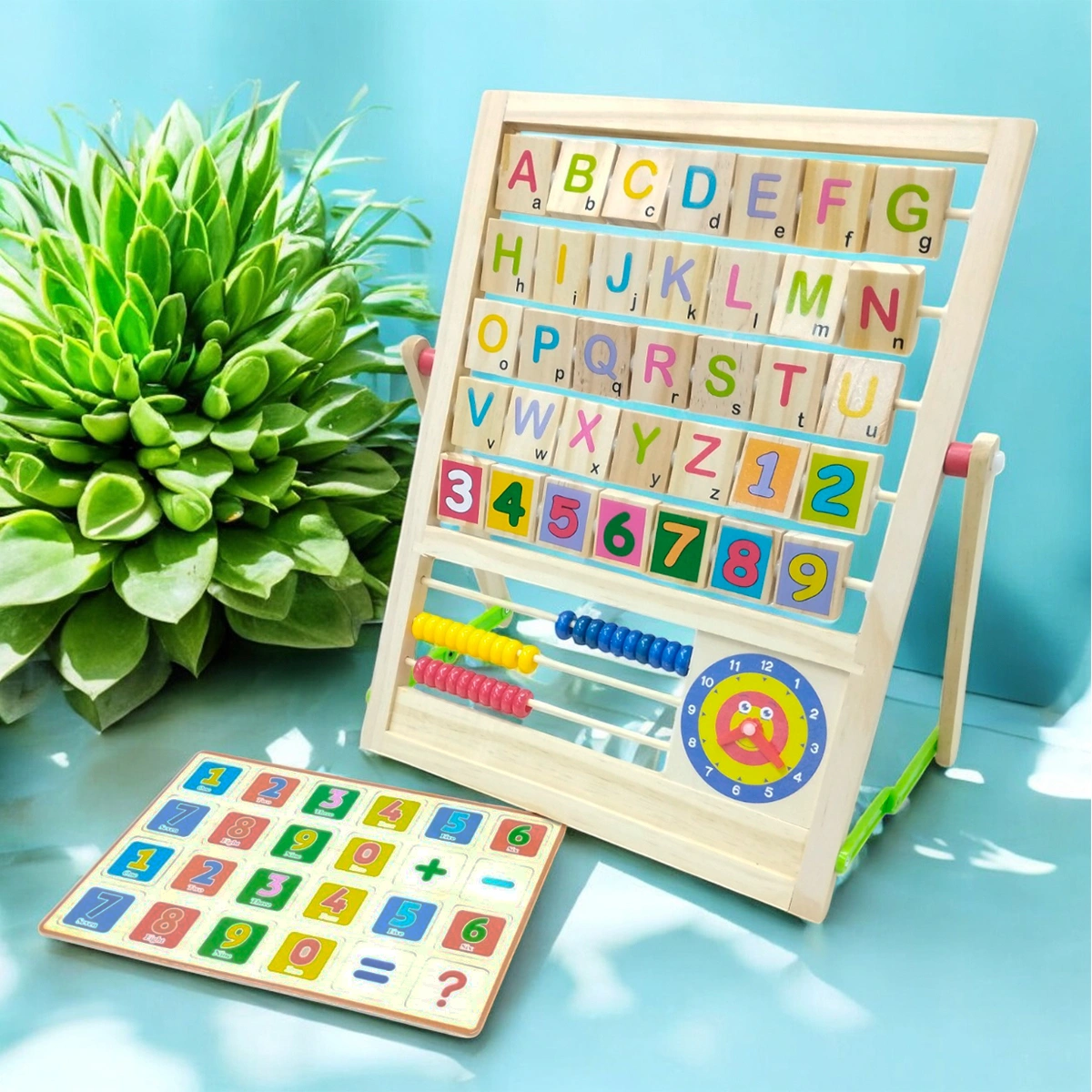 Tablero educativo infantil con letras, números y ábaco.