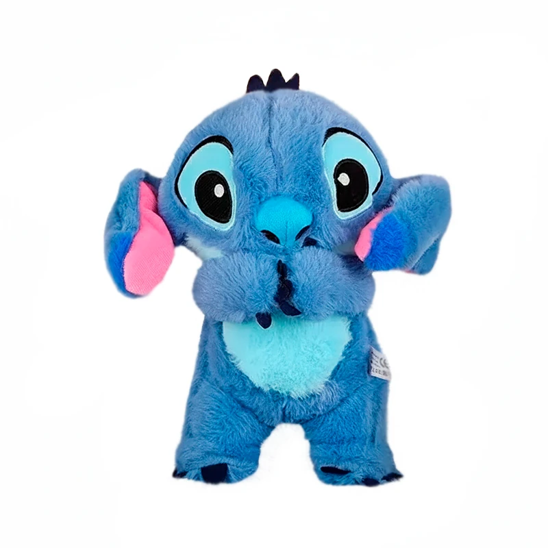 Peluche azul con orejas rosadas y ojos grandes.