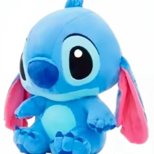 Peluche azul de Stitch con orejas rosadas y ojos grandes.