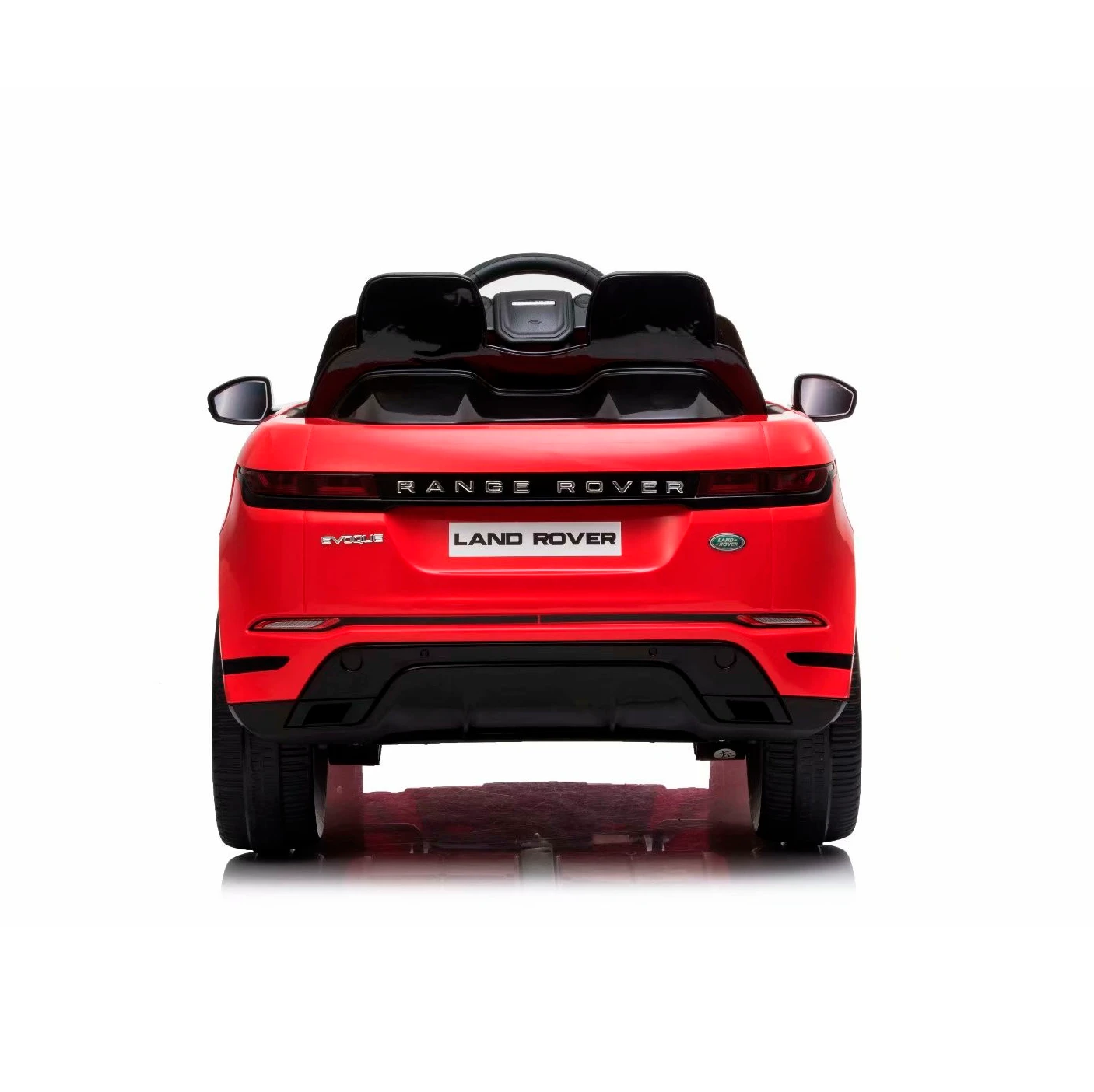 Carro eléctrico montable infantil Land Rover rojo visto desde atrás.