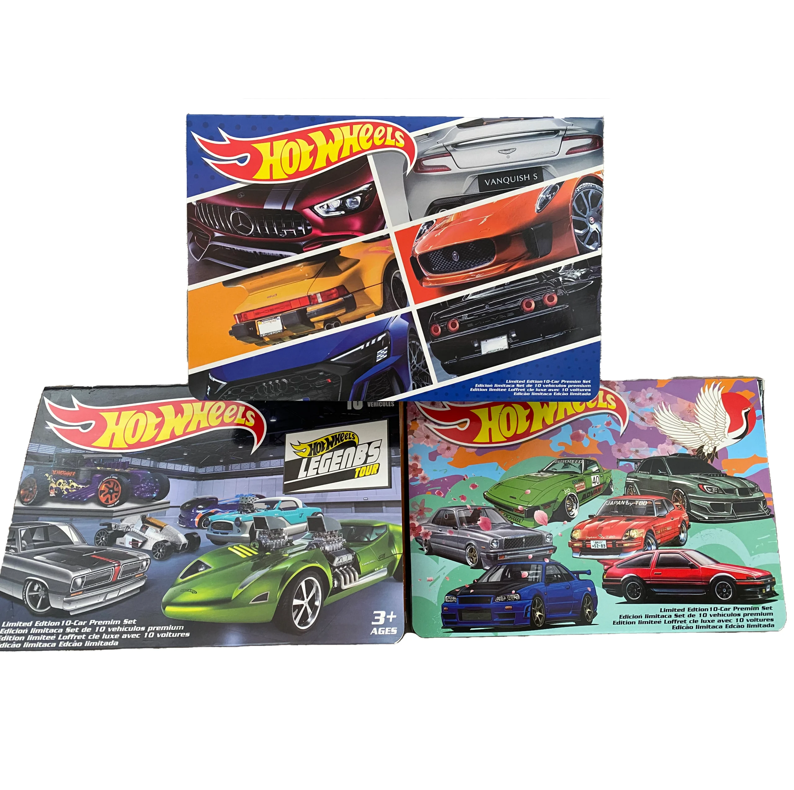 Tres cajas de sets de carros Hot Wheels con diseños variados.