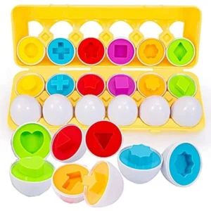 Huevos didácticos Montessori con formas y colores en caja amarilla.