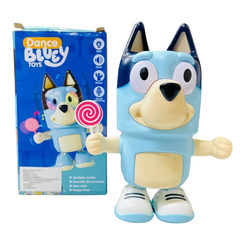 Juguete Bluey bailando, sosteniendo un caramelo con caja de fondo.